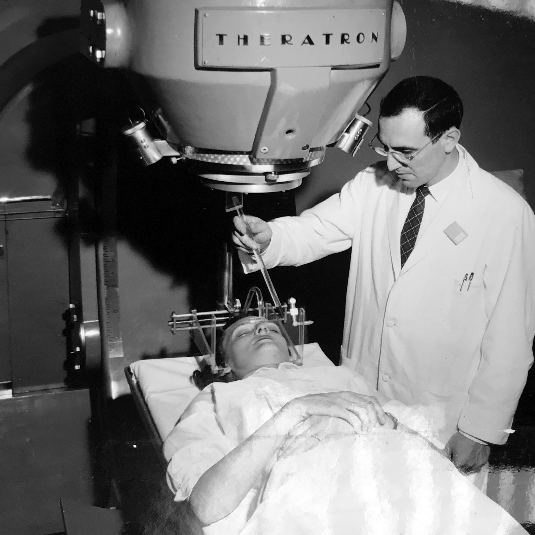 Person testing with a Theratron on a patient